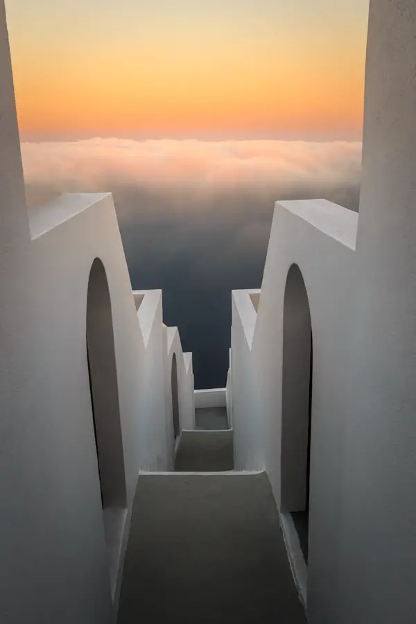 Steps down to the clouds at sunrise at Kasimatis Suites in Santo
