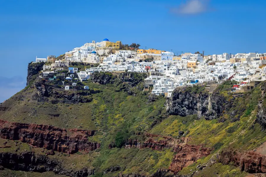 Imerovigli viewed from Fira with the white buildings on top of the caldera