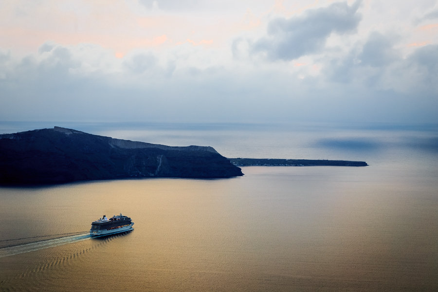 Ferry leaving the Port of Fira and the Greek Island of Santorini